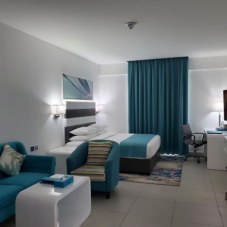 City Avenue Al Reqqa Hotel Дубай Экстерьер фото