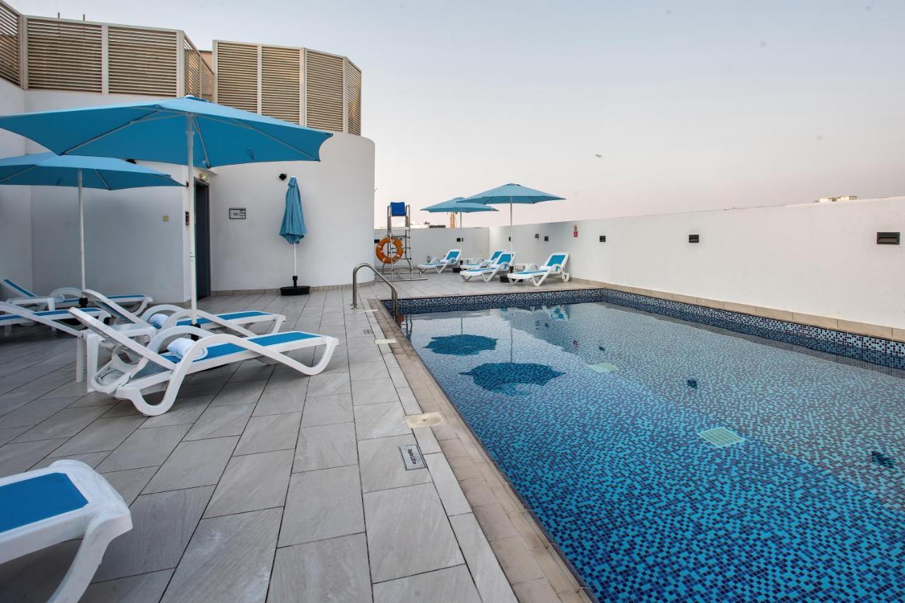 City Avenue Al Reqqa Hotel Дубай Экстерьер фото