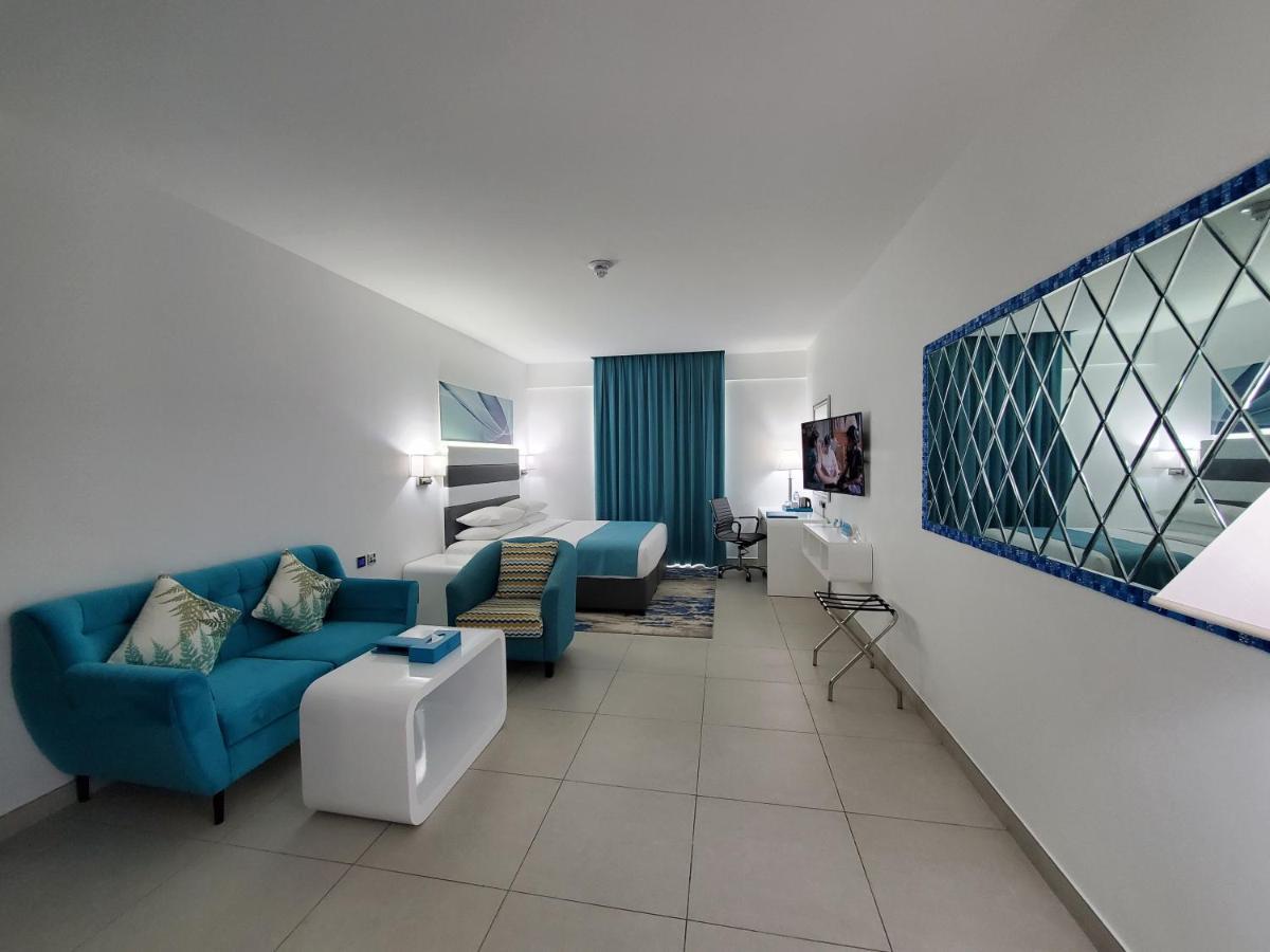 City Avenue Al Reqqa Hotel Дубай Экстерьер фото