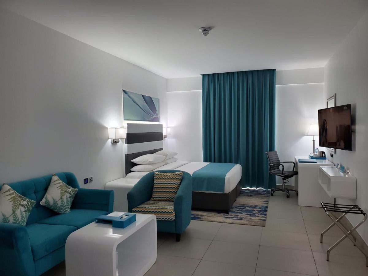 City Avenue Al Reqqa Hotel Дубай Экстерьер фото