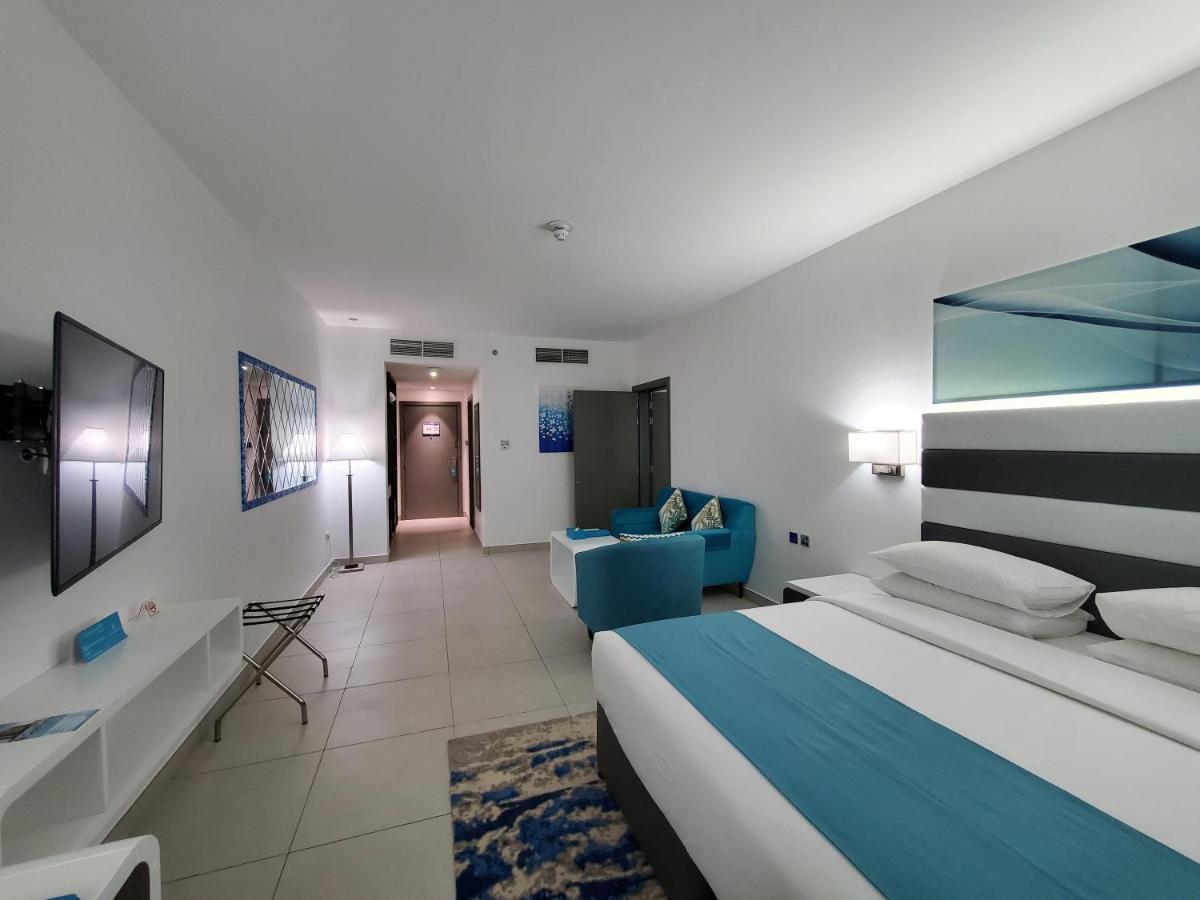 City Avenue Al Reqqa Hotel Дубай Экстерьер фото